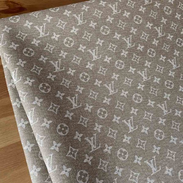 Louis vuitton beige vinyl fabric seem like denim