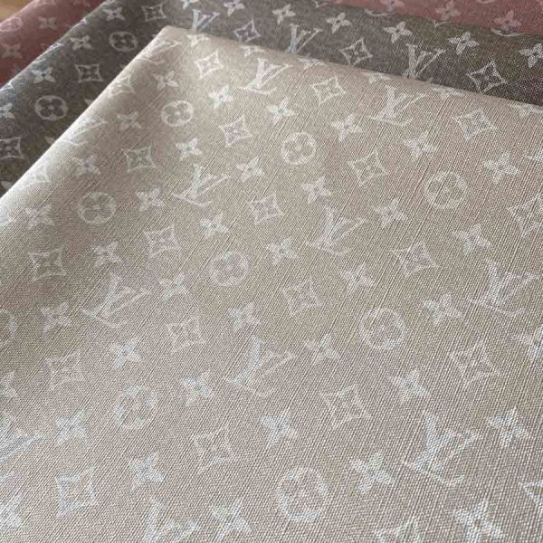 Louis Vuitton Ivory Vinyl Fabric seem like denim/jeans