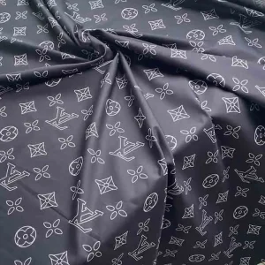 thin black louis vuitton cotton fabric for dress making which has white patterns