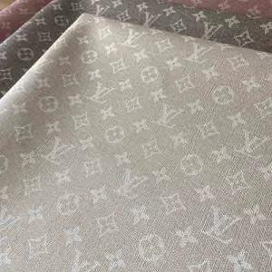 Louis vuitton do not have too much ivory leather alternatives. This product is unique thats why. The louis vuitton monogram canvas print is standart sized however it is printed like it is a denim fabric. This also makes that fabric a waterproof vinyl material but seems like jeans.