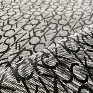 grey calvin klein jacquard fabric with black patterns