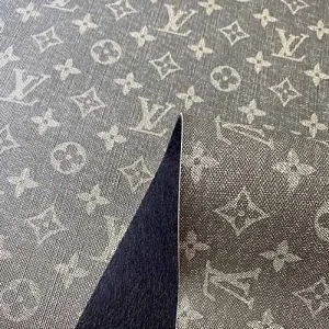 green louis vuitton leather fabric with a denim look pattern