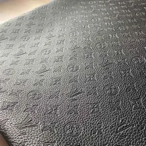 louis vuitton black leather fabric with hot press empreinte patterns