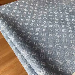 louis vuitton leather fabric with a light blue denim print