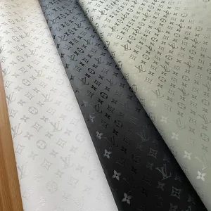 louis vuitton white vinyl material used for titanium bags