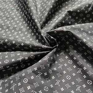 LV Black Nylon Liner Fabric with white embroideredpatterns