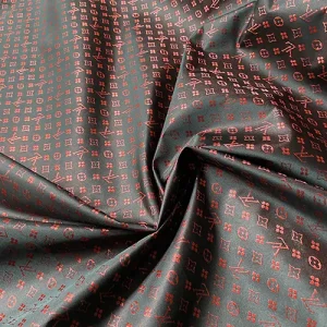 Louis Vuitton thin nylon liner black fabric with dark red lv patterns.